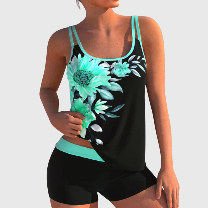 Floral print tankini with a dark base in blue, yellow and turquoise colourways