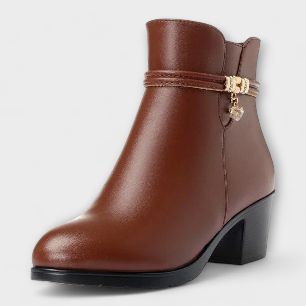 Heeled zip winter boots in brown and black with a smooth upper and elegant silhouette