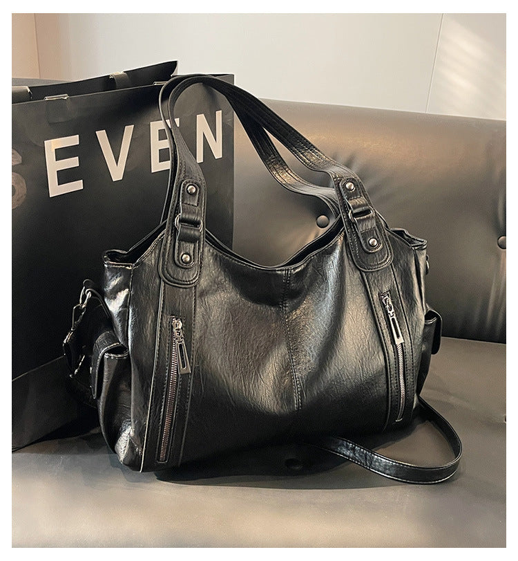 Classic structured tote bag in dark brown with comfortable shoulder straps