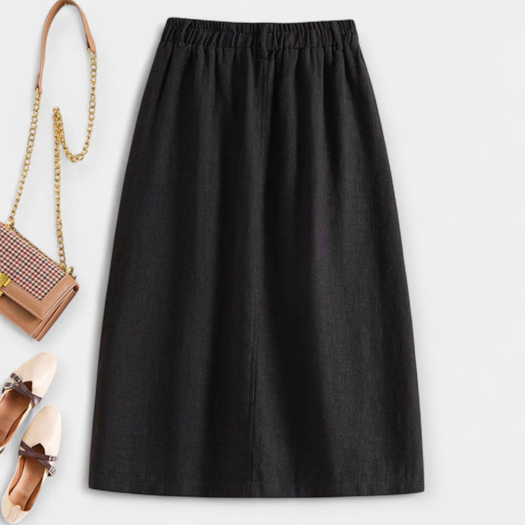 High-waist vintage-style midi skirt in dusty rose with functional front pockets