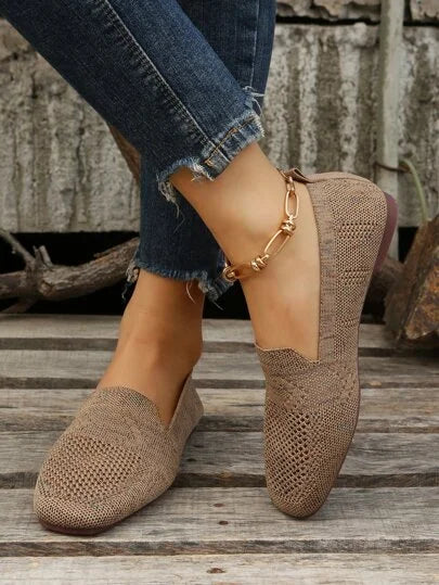 Lightweight breathable slip-on shoe in beige, available in a wide range of colours including black, brown, purple and leopard print