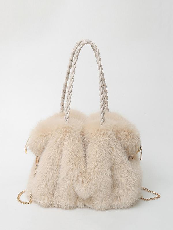 Soft-touch shoulder bag in deep brown with a plush, luxurious texture