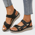 Cushioned comfort sandals in beige and black with adjustable velcro straps