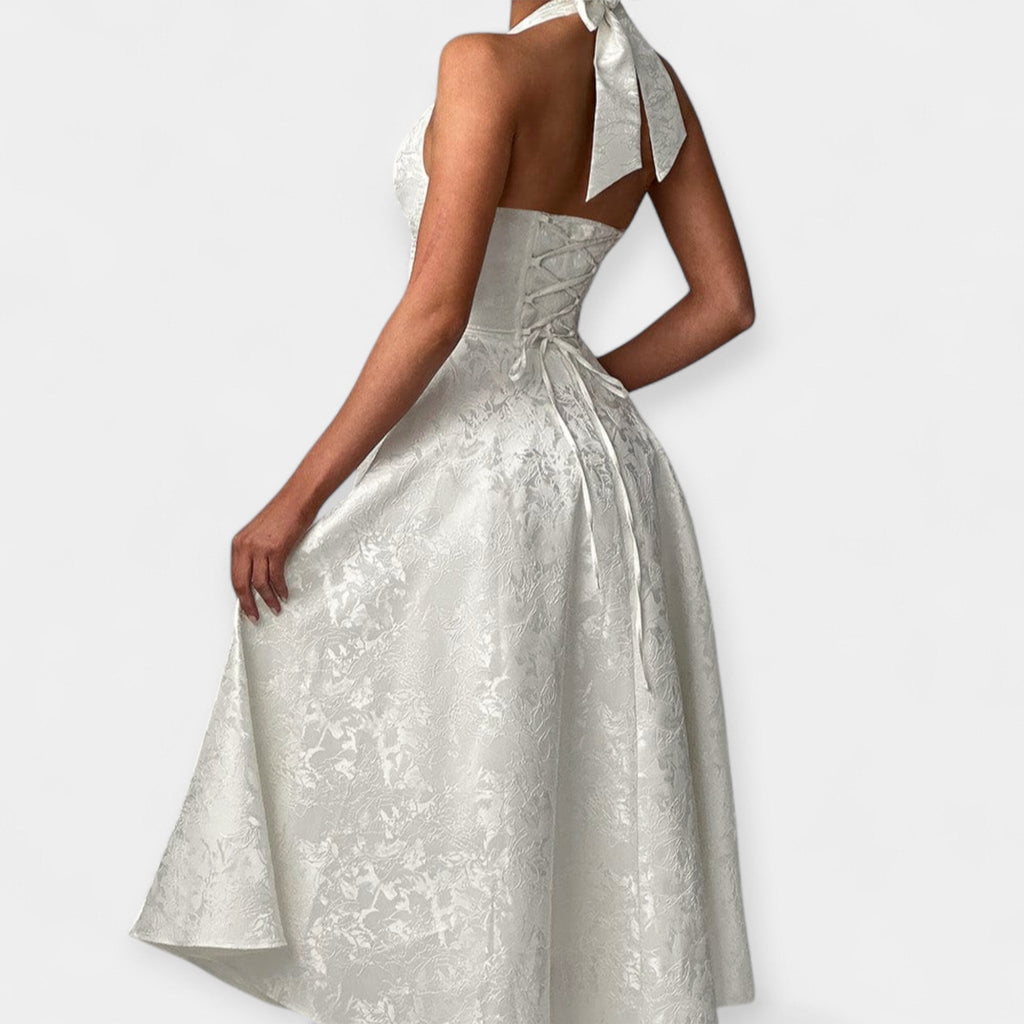 Floral-texture midi dress with structured corset bodice and adjustable open back in white