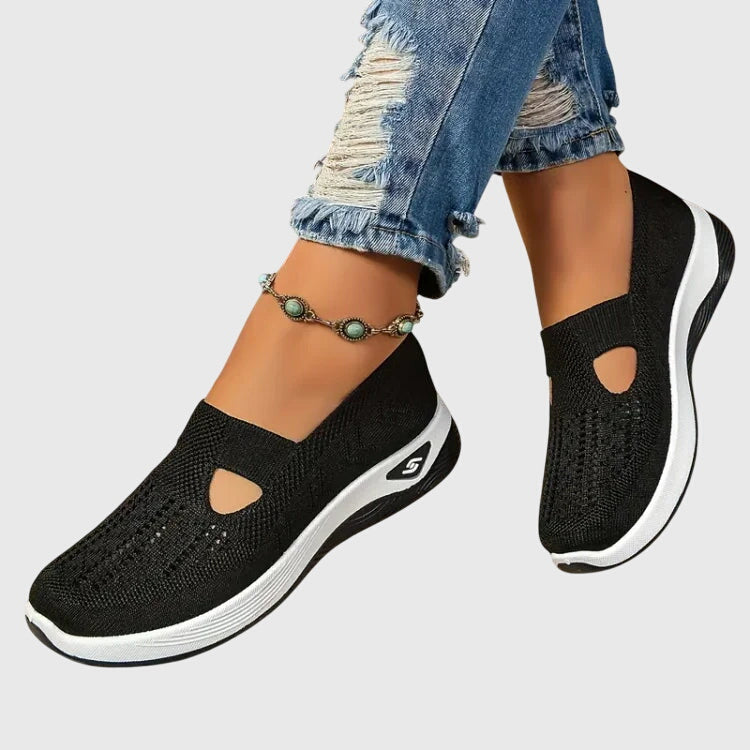 A woman out for a long walk in supportive orthopaedic walking shoes.