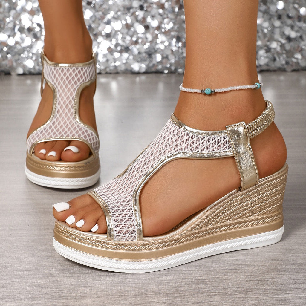 Elegant wedge sandals with a shimmer embellished upper and ankle strap in black and beige