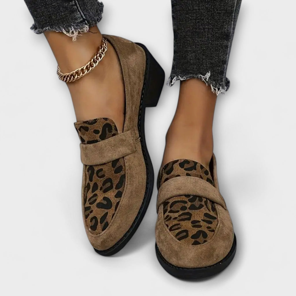 Leopard print loafers in brown tones with a classic, elegant silhouette