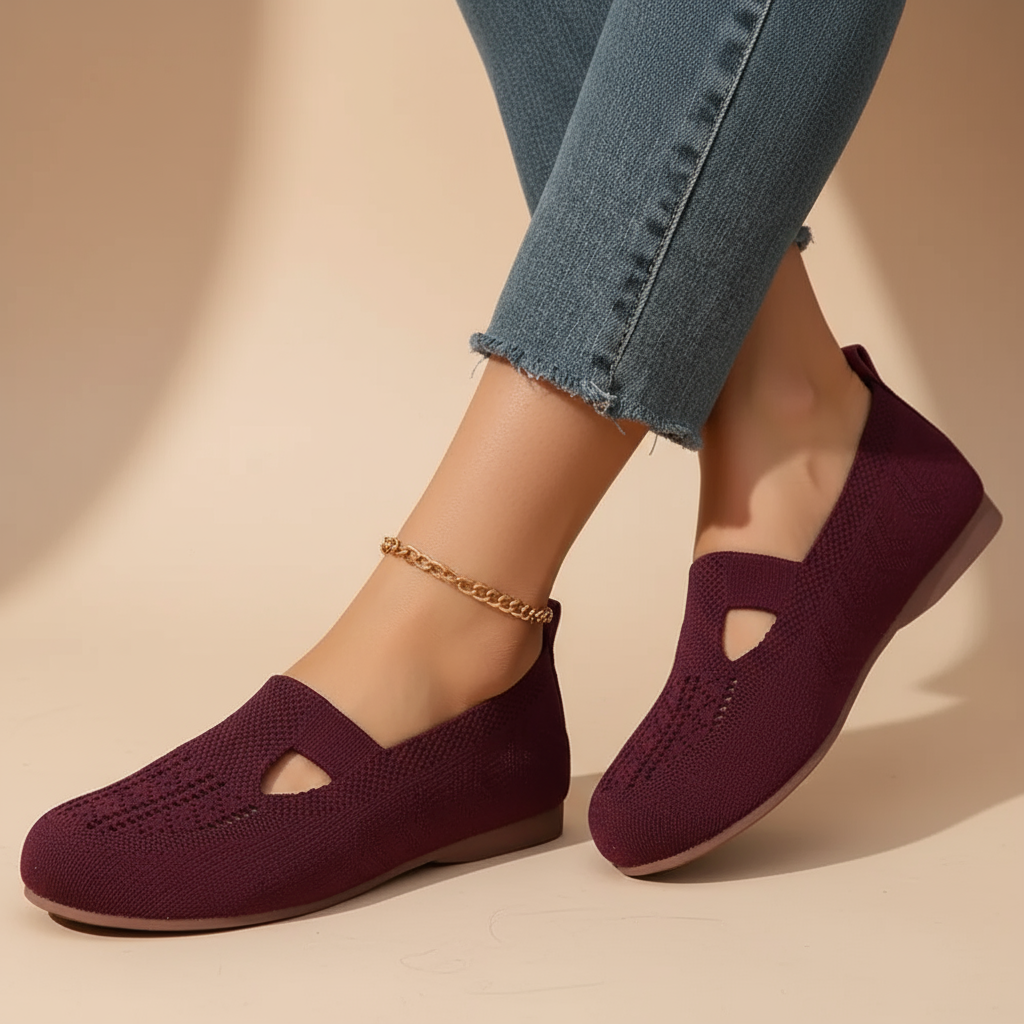 Closed breathable ballet flats in a warm beige tone with a clean, simple silhouette