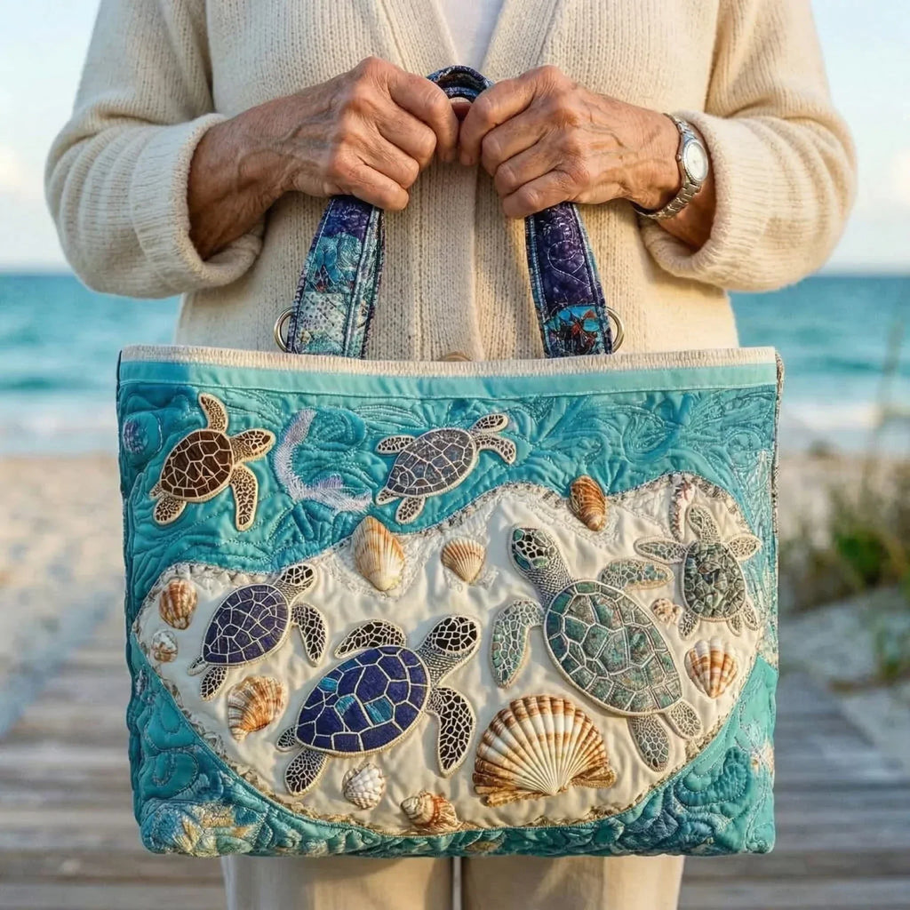 Quilted tote bag with a pair of turtles motif in soft warm tones