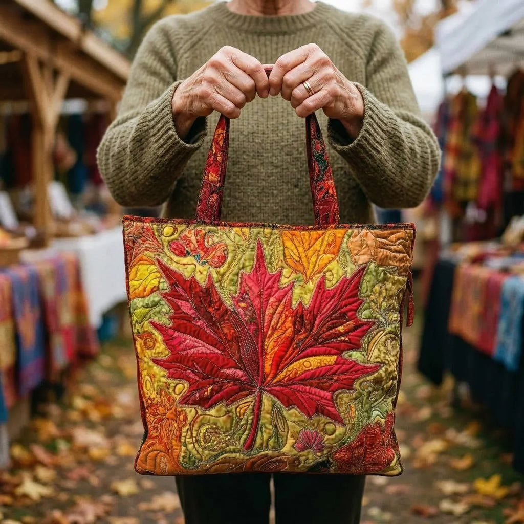 Quilted tote bag with a maple tree in amber and golden autumn sunset colours