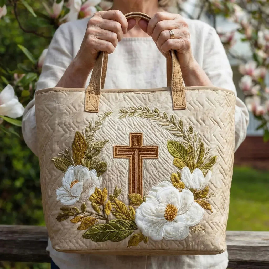 Quilted tote bag with a sacred cross motif on a structured padded body with wave-stitch detail