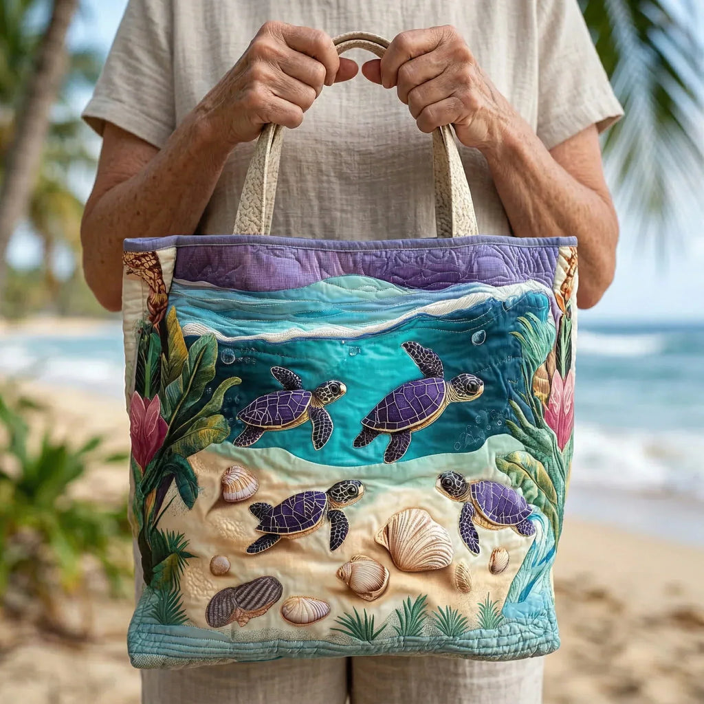 Quilted tote bag with a calming lagoon spirit motif in blue and green tones on a structured padded body
