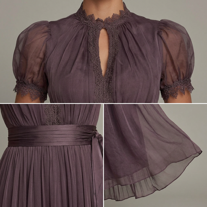 Elegant floaty layered occasion dress with a defined waist and delicate sleeve details
