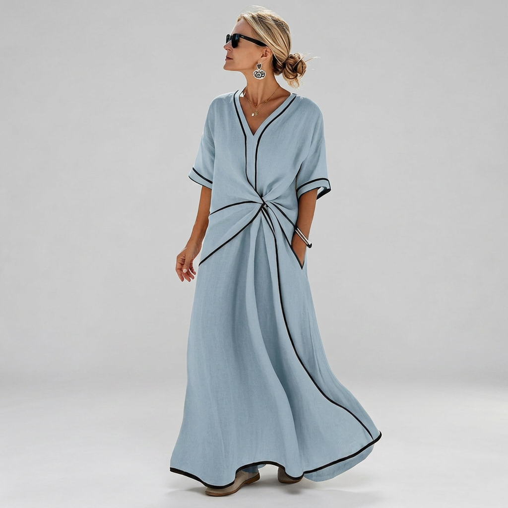 Women's waist-defining dress in blue with a draped front detail and flowy skirt
