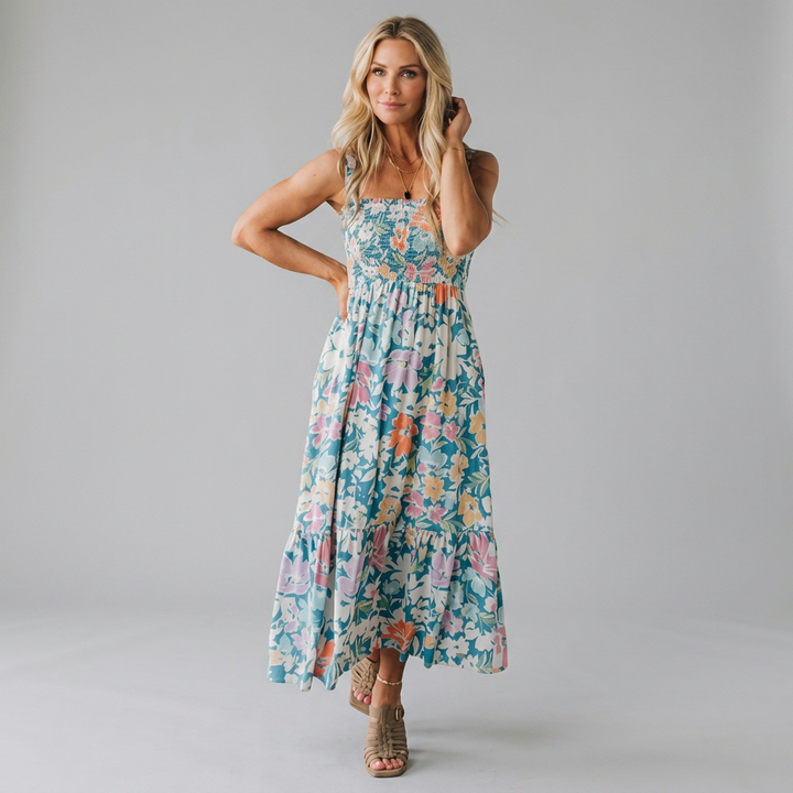 Light, floaty summer dress with an elasticated upper and airy skirt in a soft, feminine style