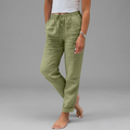 Light women's summer trousers in green with a wide, flowing leg silhouette