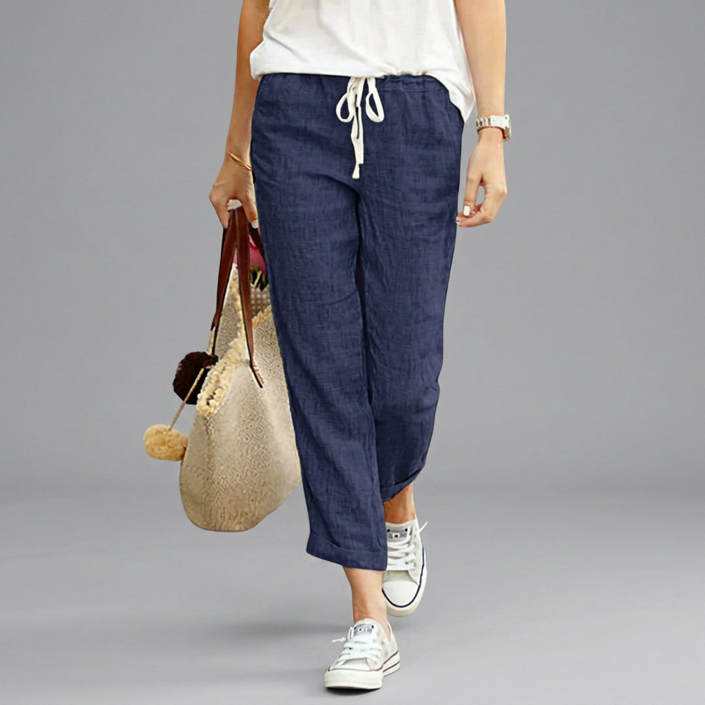 Women's wide-leg drawstring trousers in beige with a relaxed flowing silhouette