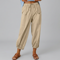 Wide-leg drawstring trousers in khaki with an elasticated waist and relaxed silhouette
