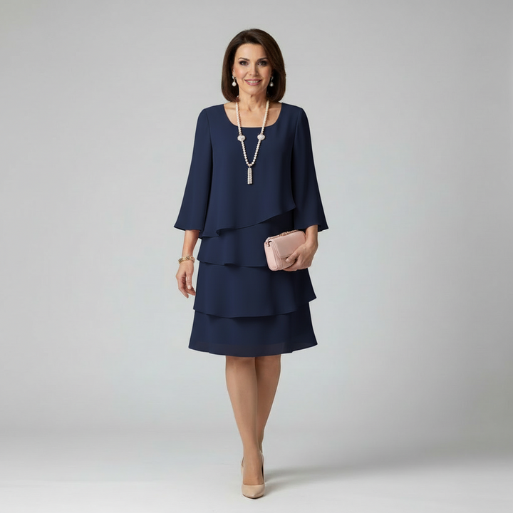 Pink layered elegant dress with a flowing silhouette and soft, light construction