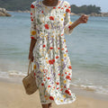 Flowing floral maxi dress with a round neckline in a warm relaxed print