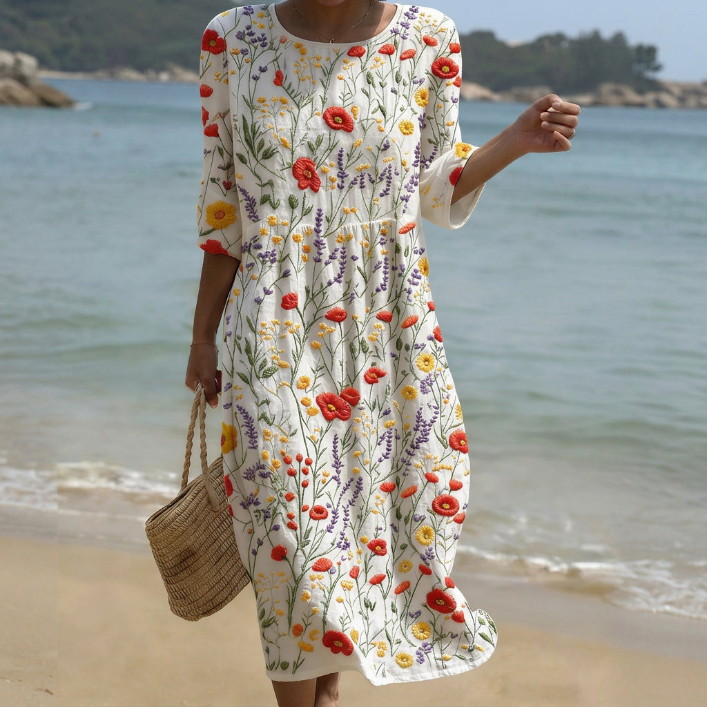 Flowing floral maxi dress with a round neckline in a warm relaxed print