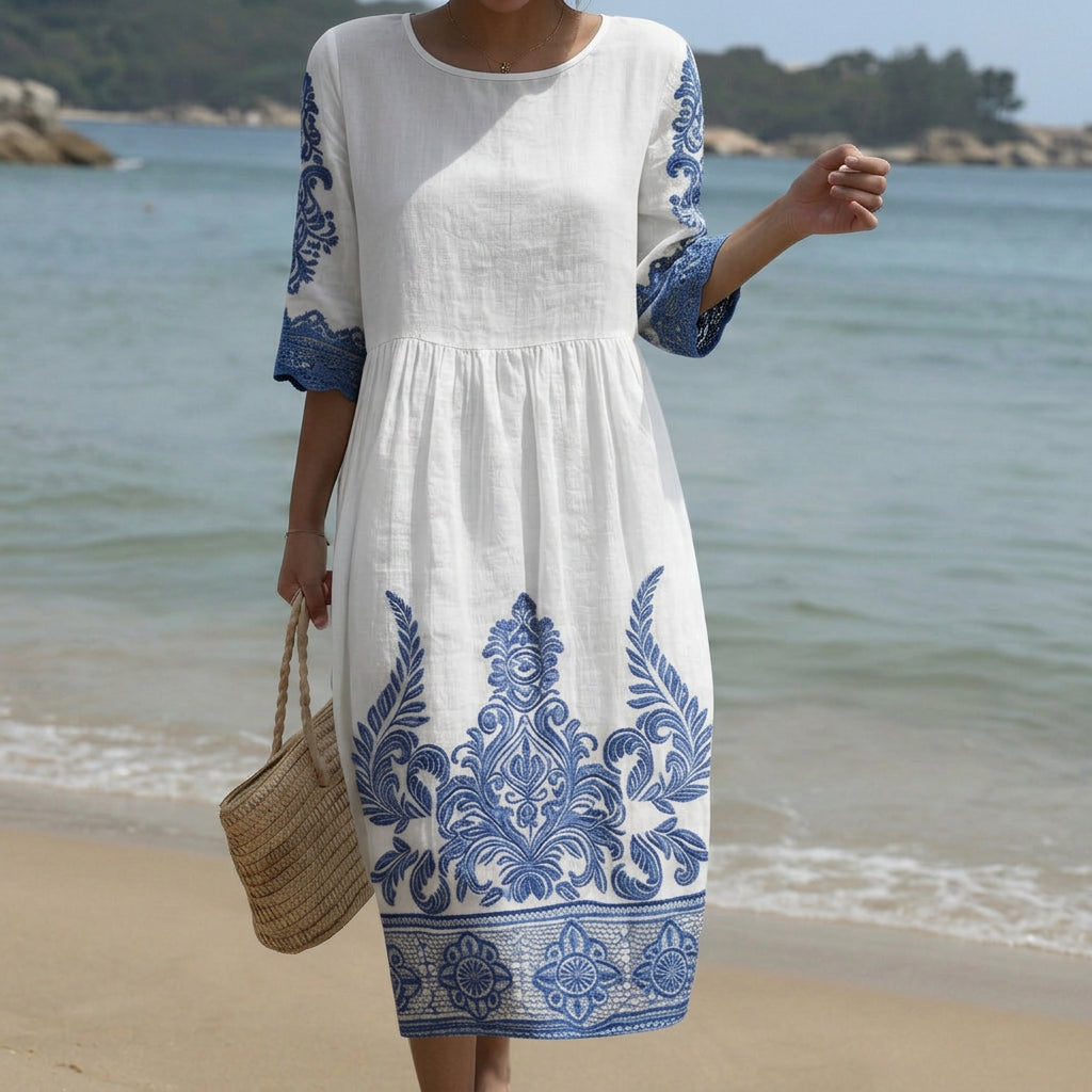 Flowing floral maxi dress with a round neckline and easy relaxed silhouette