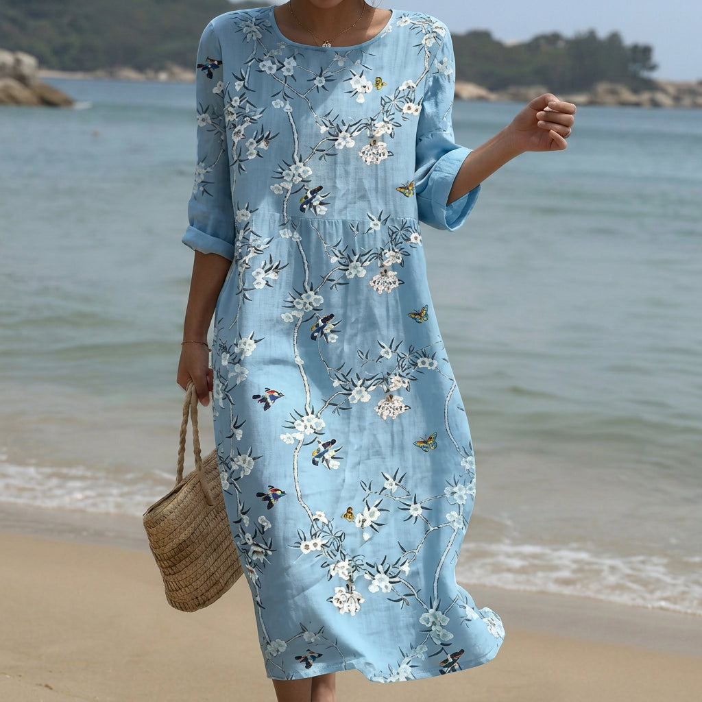 Relaxed-cut floral maxi dress with a round neckline in a flowing warm-weather print