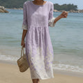 Relaxed-fit floral maxi dress with a gentle round neckline in a flowing print