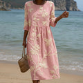 Flowing botanical print midi dress with a soft relaxed flattering silhouette