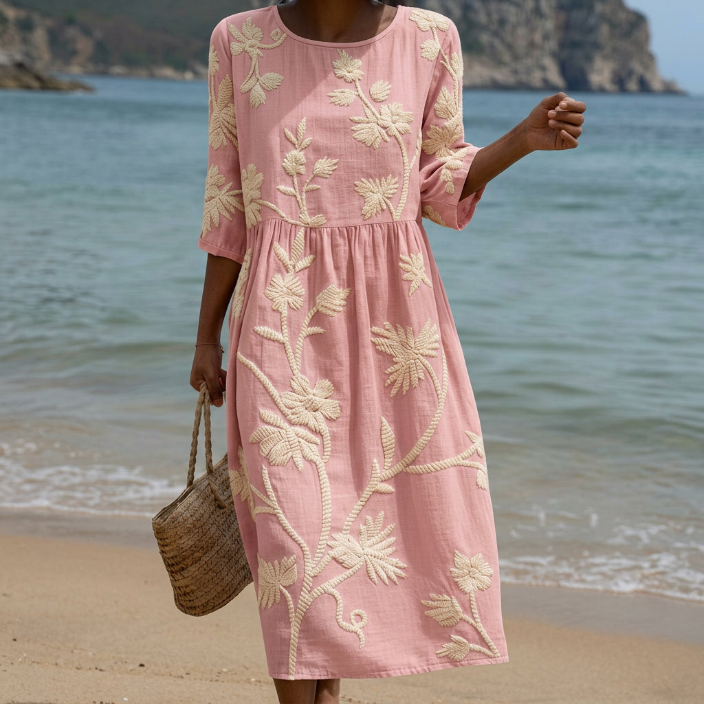 Flowing botanical print midi dress with a soft relaxed flattering silhouette