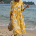 Botanical print midi dress with a gently flowing relaxed silhouette