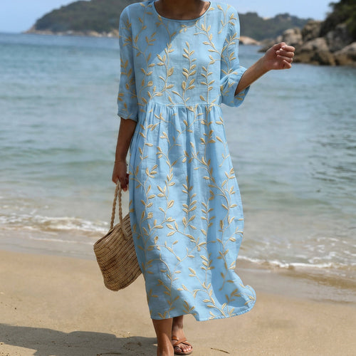 Midi dress with a botanical floral print and flowing relaxed silhouette