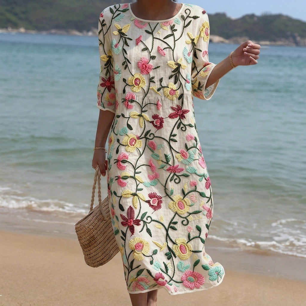 Fluid floral maxi dress with a classic botanical print in soft summer tones