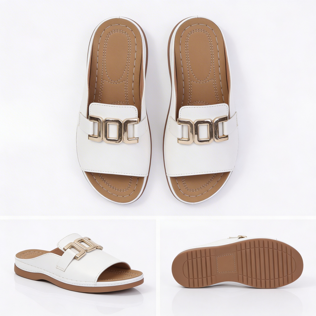 Minimalist flat sandals in beige and white with a clean, simple strap design