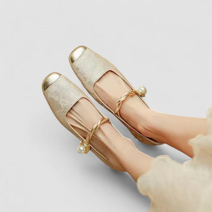 A woman wearing embellished green Mary Jane flats at a special occasion.