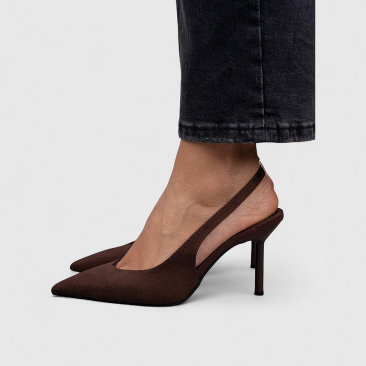 Women's pointy-toe slingback heels in beige with a slender heel and minimalist design