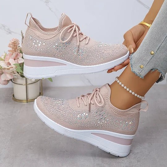 A woman walking comfortably outdoors in supportive everyday shoes.