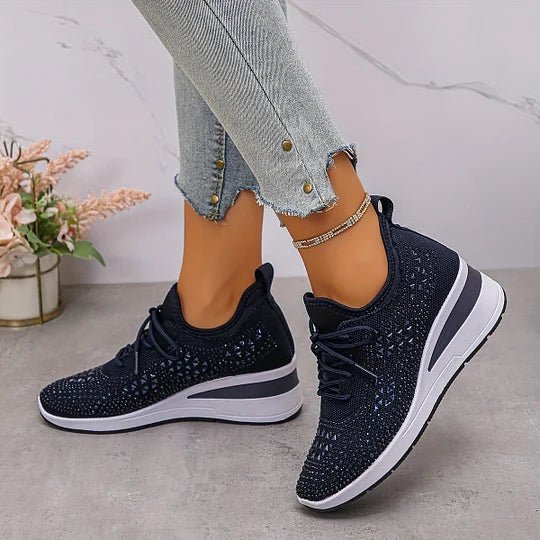 A woman walking comfortably outdoors in supportive everyday shoes.