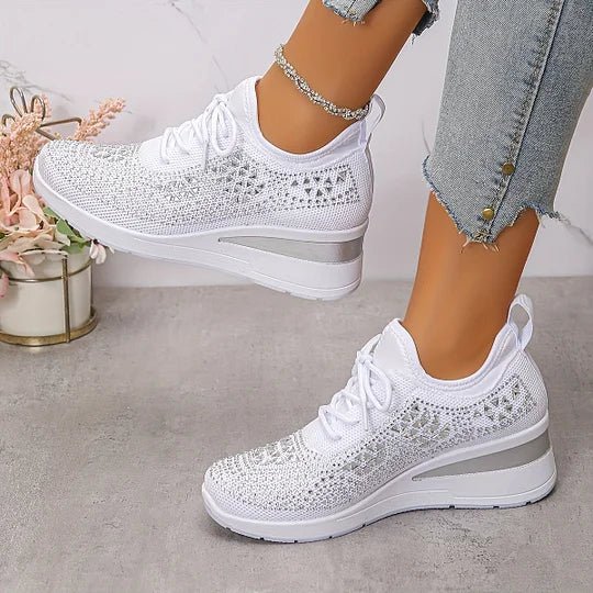 A woman walking comfortably outdoors in supportive everyday shoes.
