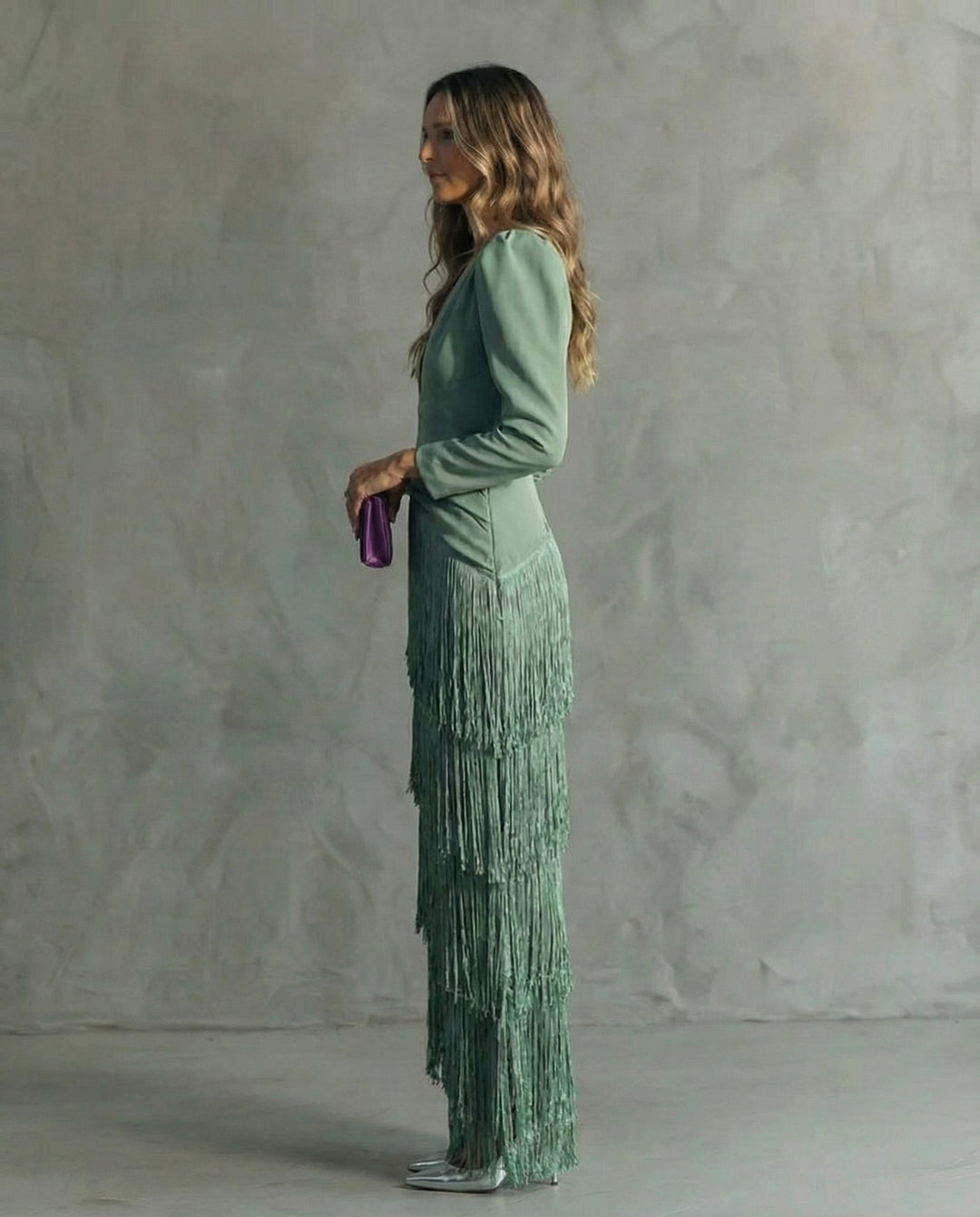 Women's light green fringe occasion dress with a figure-skimming cut and deep V-neckline