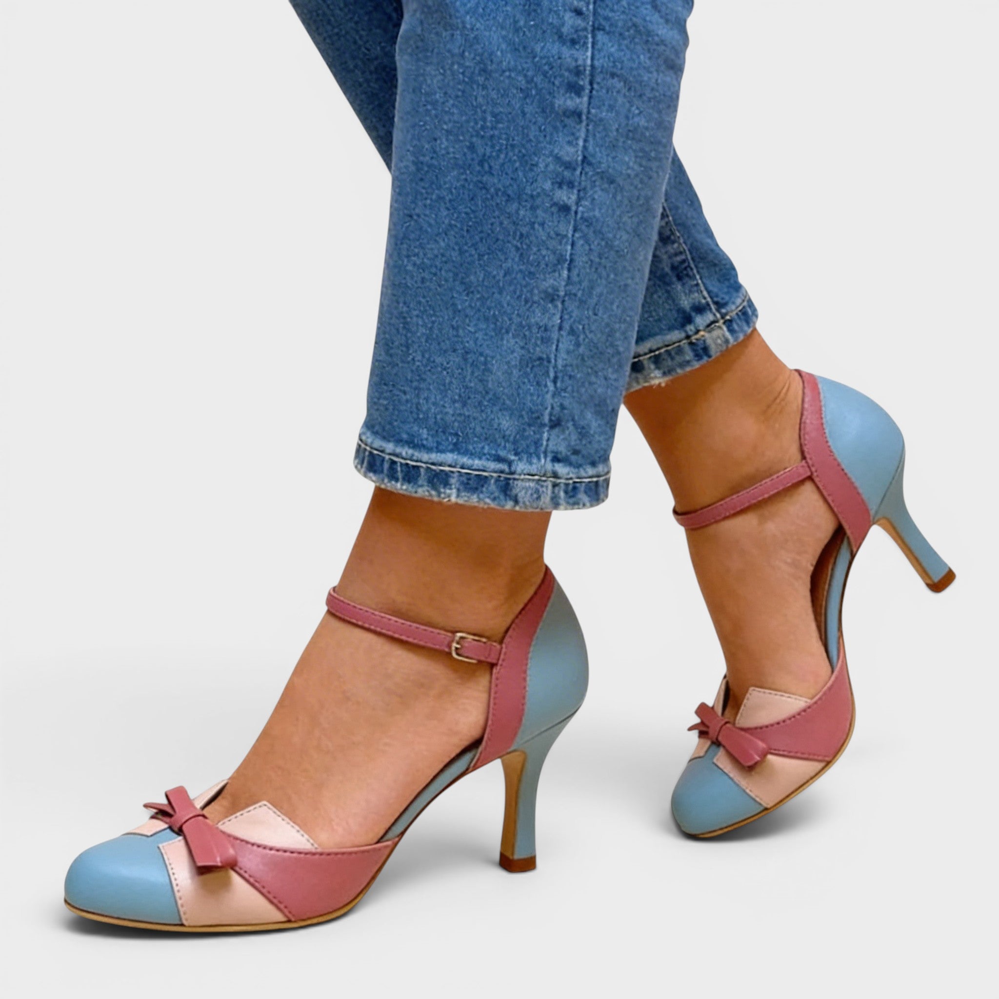 Women's elegant cushioned heels in blue with a stable mid-height heel and refined silhouette