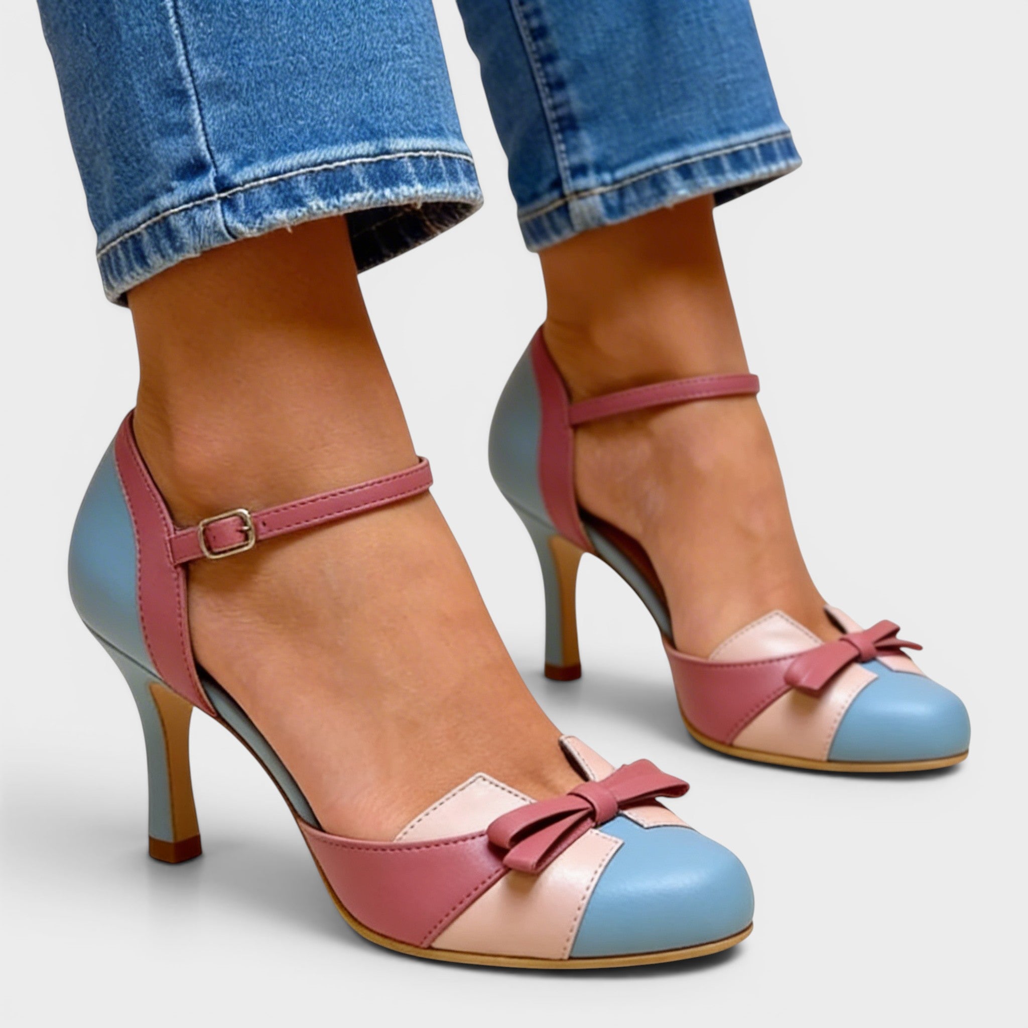 Women's elegant cushioned heels in blue with a stable mid-height heel and refined silhouette