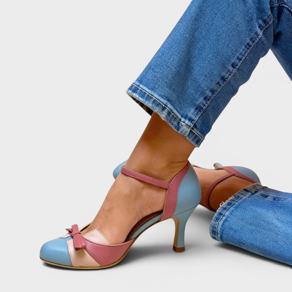 Women's elegant cushioned heels in blue with a stable mid-height heel and refined silhouette