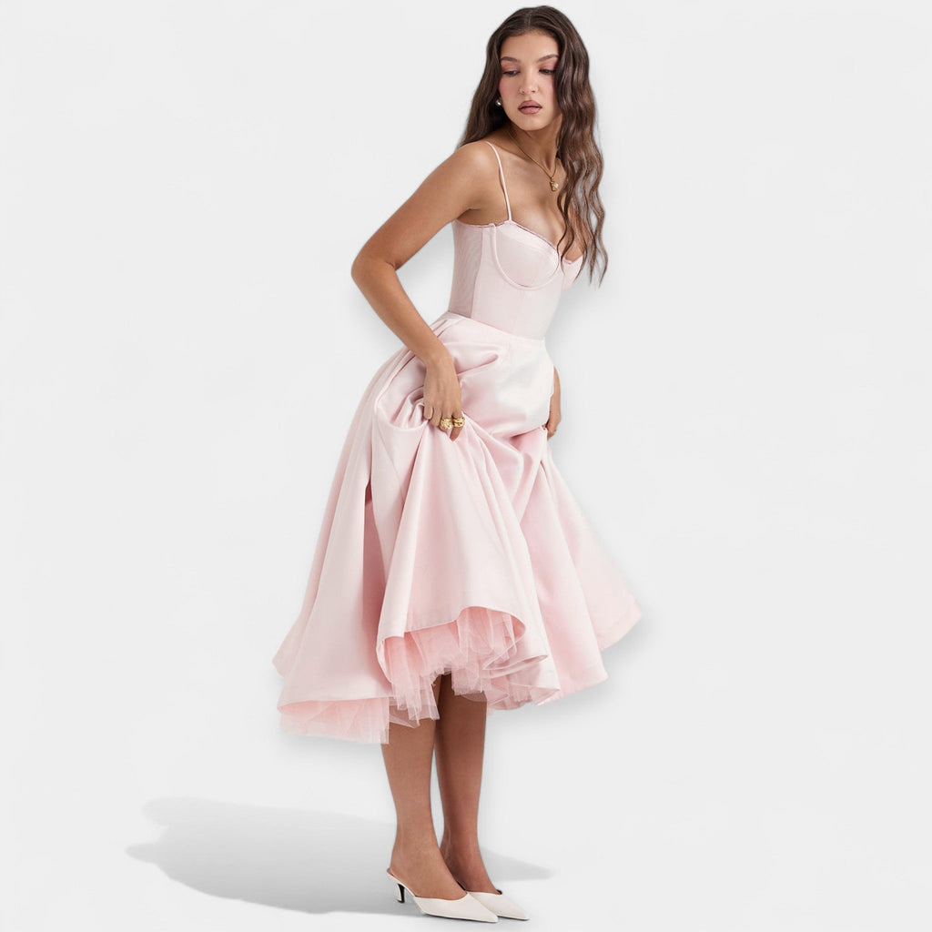 Romantic layered midi dress with full skirt and hidden pockets in soft blush pink
