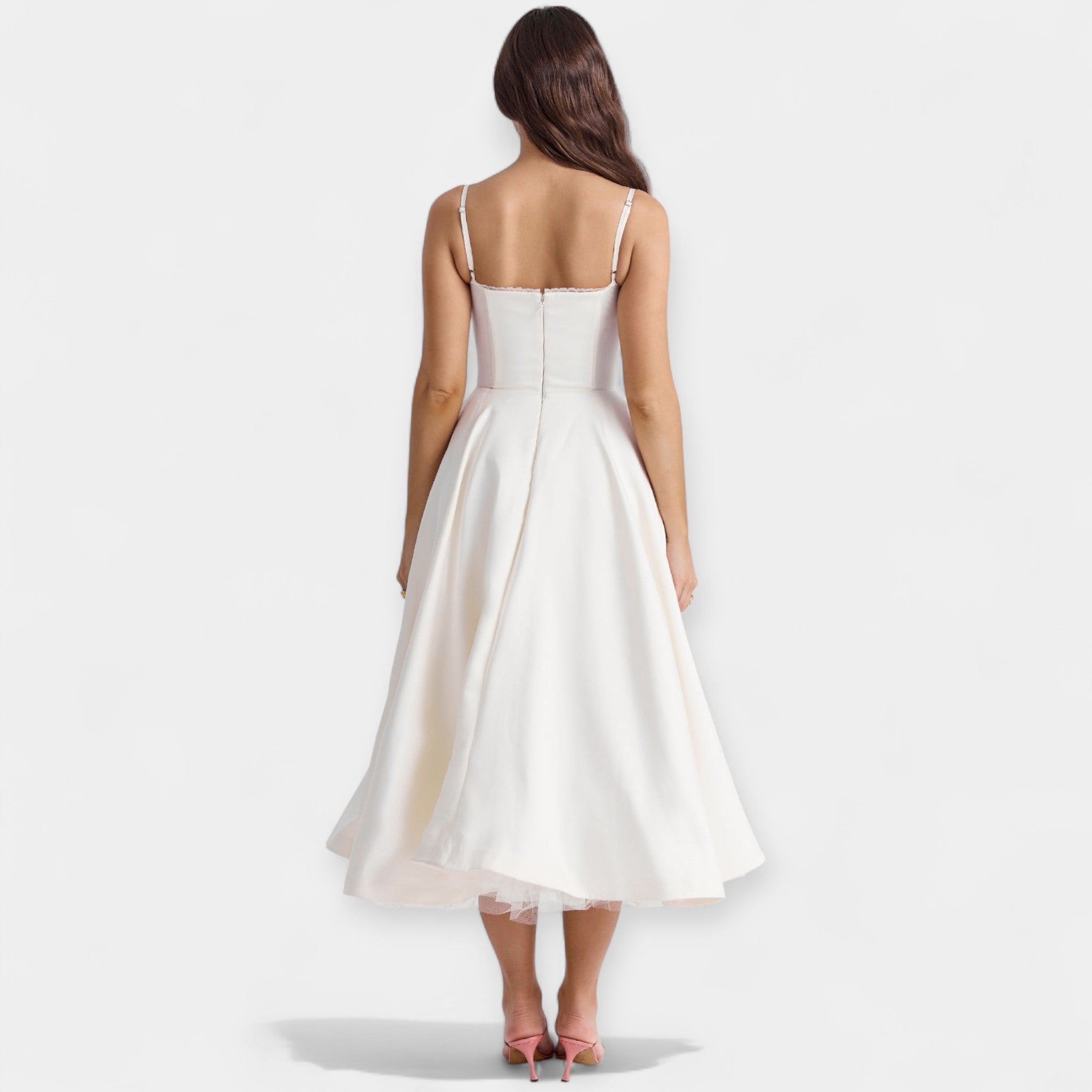 Romantic layered midi dress with full skirt and hidden pockets in soft blush pink