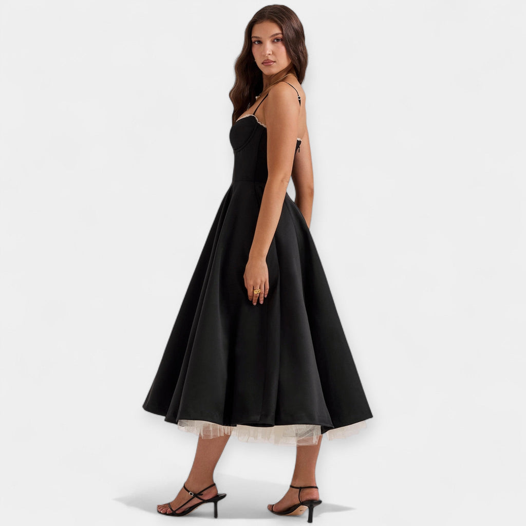 Romantic layered midi dress with full skirt and hidden pockets in soft blush pink