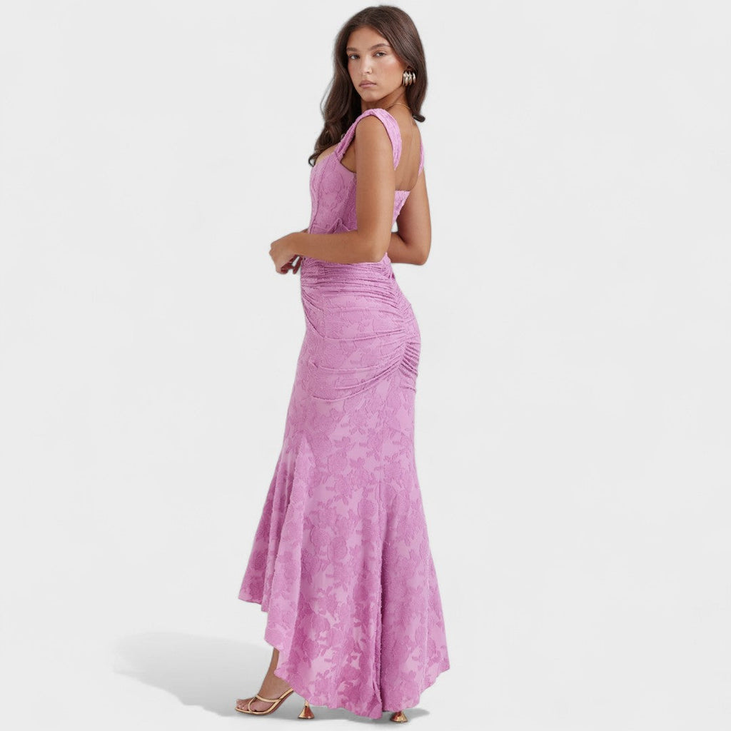 A romantic cream midi dress with square neckline and asymmetric hem, styled for a garden party