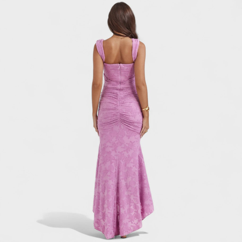 A romantic cream midi dress with square neckline and asymmetric hem, styled for a garden party