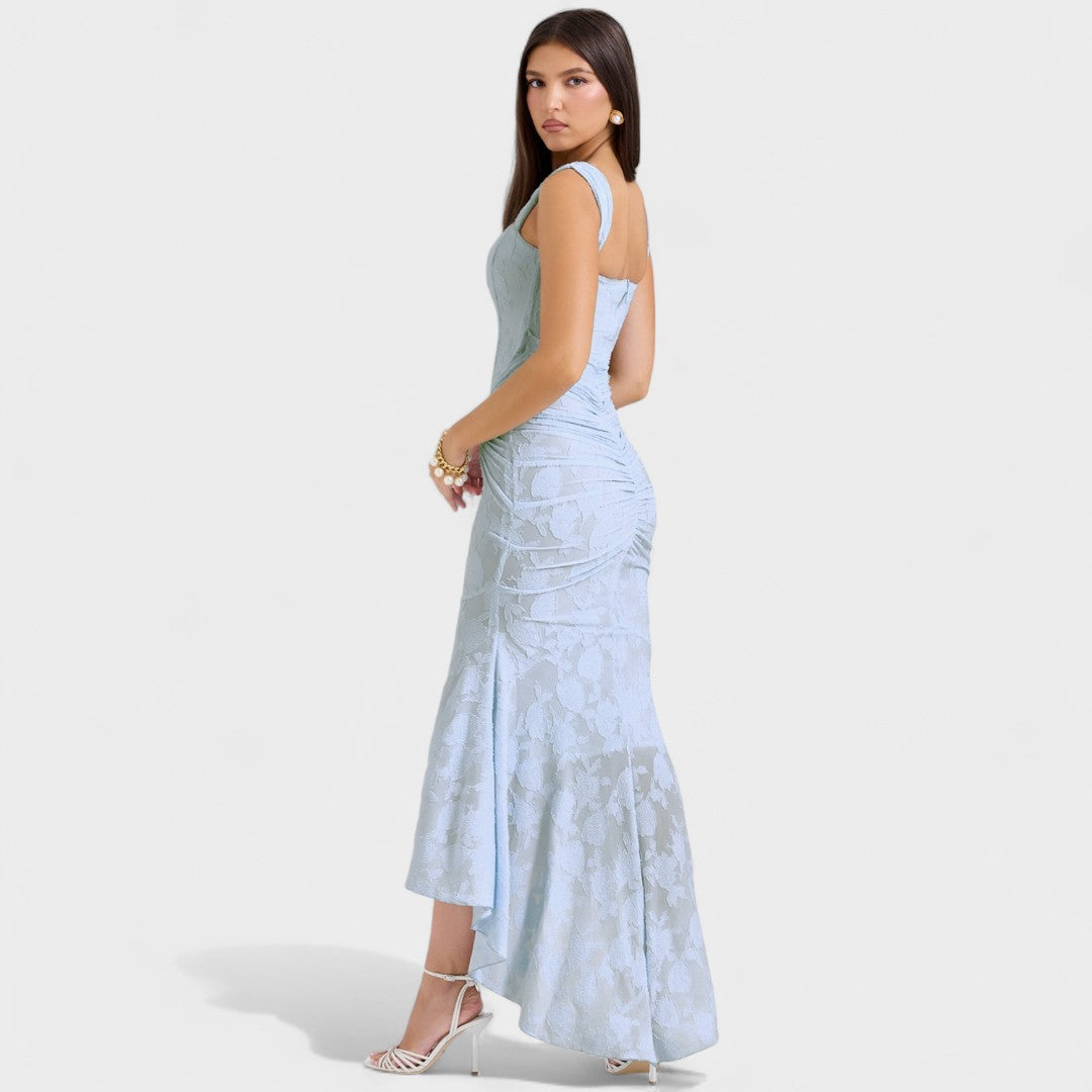 A romantic cream midi dress with square neckline and asymmetric hem, styled for a garden party