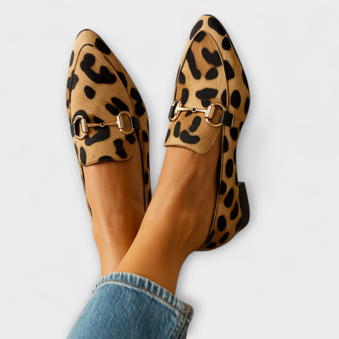 A woman wearing timeless classic loafers with a smart everyday outfit